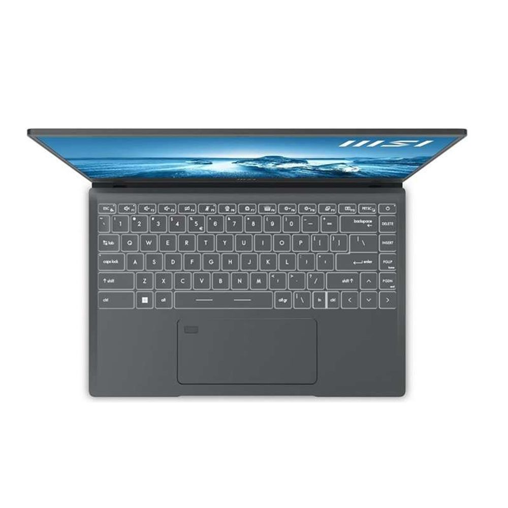 MSI gray laptop keyboard and trackpad, top view with screen visible