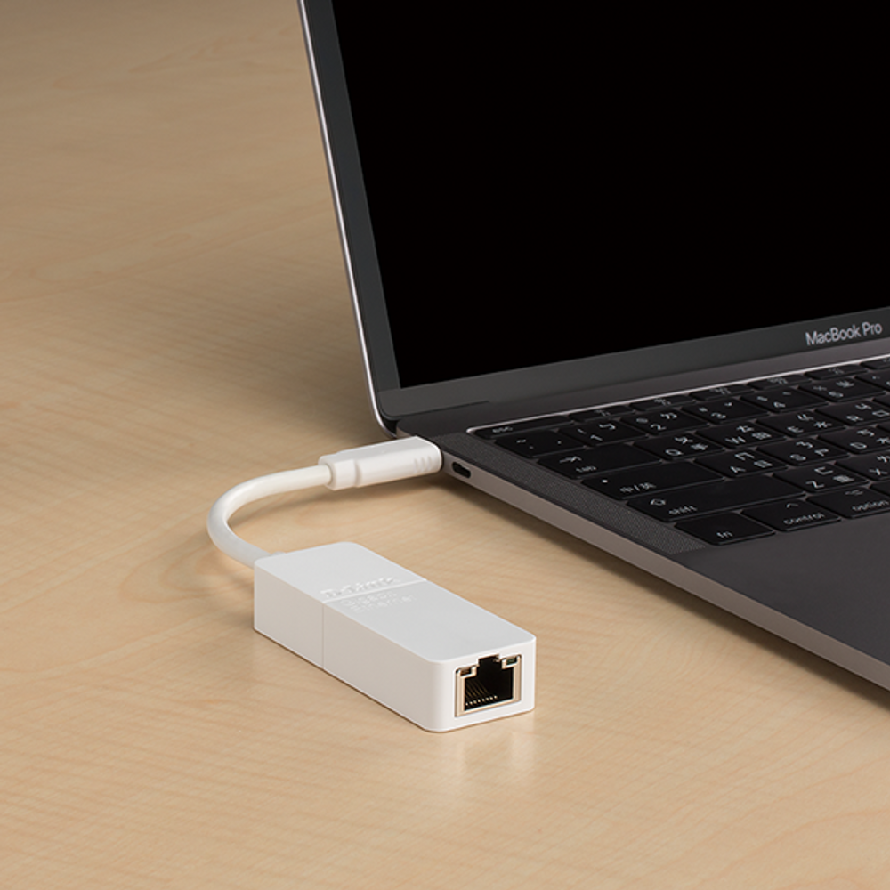 USB-C to Gigabit Ethernet adapter connected to a laptop with an RJ45 Ethernet link