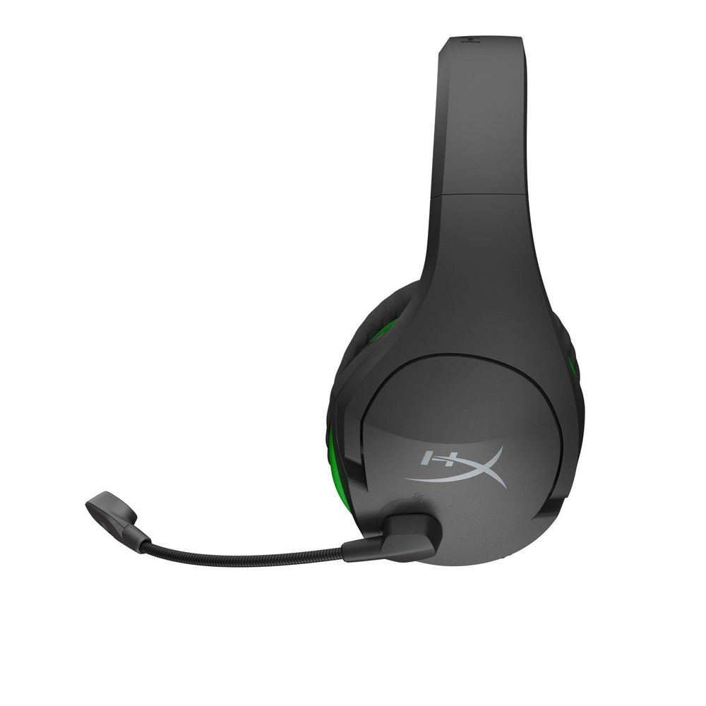Black wireless gaming headset with green edge accents and boom microphone